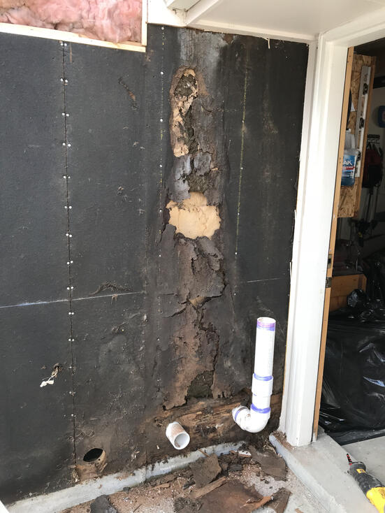 Under the siding