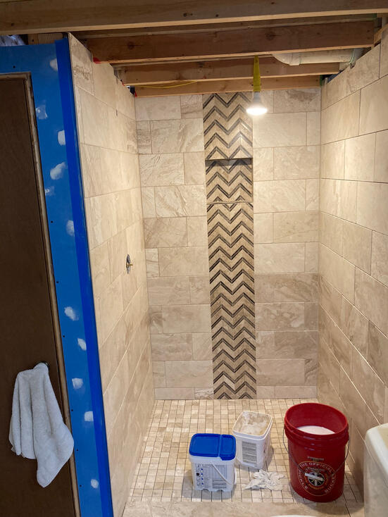 Shower surround and soap shelf